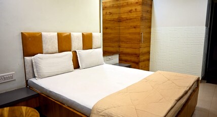 HOTEL AMBEY VALLEY Room Type - Deluxe AC Room