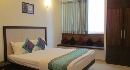 Ixora Suites (Near 100 Ft Rd & Indiranagar Metro Station) Room Type - Deluxe Room