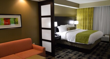 Best Western Premier University Inn Room Type - Suite-1 King Bed, Non-Smoking, Sofabed For One Person, Microwave And Refrigerator, Wi-Fi, Full Break Best Western Premier University Inn Room Type - Suite-1 King Bed, Non-Smoking, Sofabed For One Person, Microwave And Refrigerator, Wi-Fi, Full Break