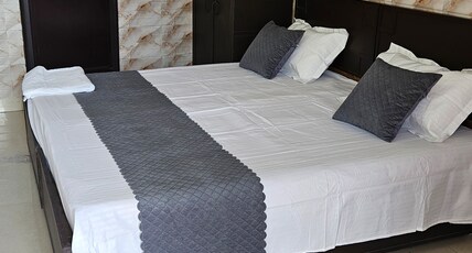 BHAGAT HOME STAY Room Type - DOUBLE BED ROOM