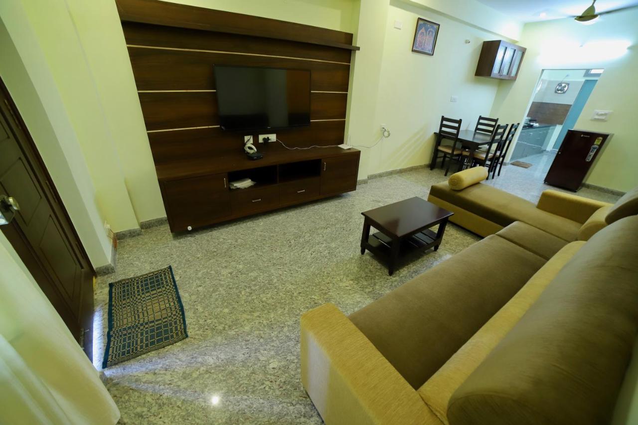 TrueLife Homestays Royal Nagar - Tap to explore photos