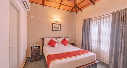 Clover Holiday Village Resort Coorg by VOYE HOMES Room Type - 2 Bedroom AC Cottage with View Clover Holiday Village Resort Coorg by VOYE HOMES Room Type - 2 Bedroom AC Cottage with View