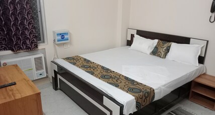 Hotel Vishwa Residency Room Type - Deluxe Room
