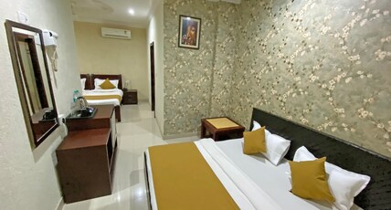Hotel Nirvana Palace Near Parmarth Niketan Room Type - Nirvana suite family Room