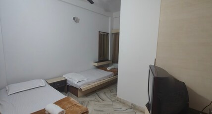 SHREVIK COMFORTS Room Type - Standard Twin Bed