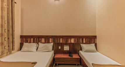 Hotel Sai Palkhi Room Type - Executive Triple Bed AC.