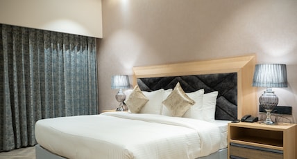 Hotel Clarks Inn Suites Kangra Room Type - Super Deluxe room with Temple view and King Bed