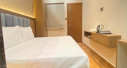 Kanhaiya Palace Hotel Room Type - Deluxe Room