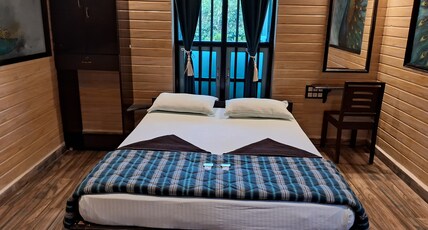 Mudravilla Room Type - A/C Deluxe cottage(Blue)