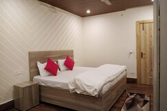 The Green Feather Residence 2BHK with a Kitchen