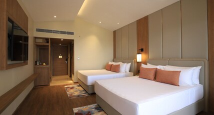 Lemon Tree Hotel, Mall of Dehradun Room Type - Family Room with Balcony