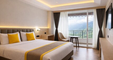 Hotel Mid Town (2 min to walk MG Marg) Room Type - Deluxe Balcony Room with Panoramic Mountain View