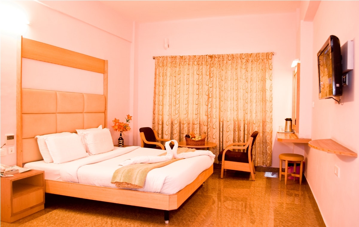 Hotel Rajadhane - Tap to explore photos