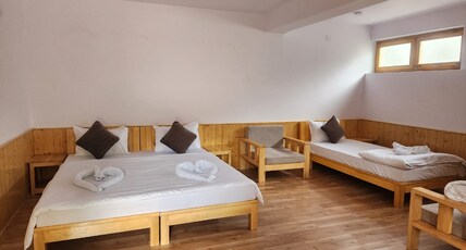 Nimoo Miles Room Type - Deluxe Room with Garden View King Bed