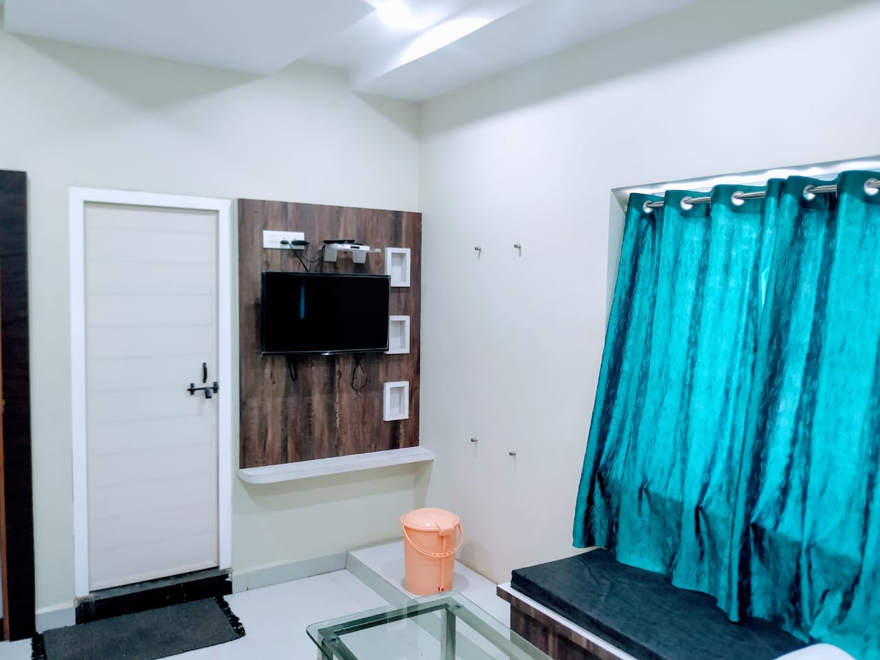 Ashwini Comforts Deluxe - Tap to explore photos