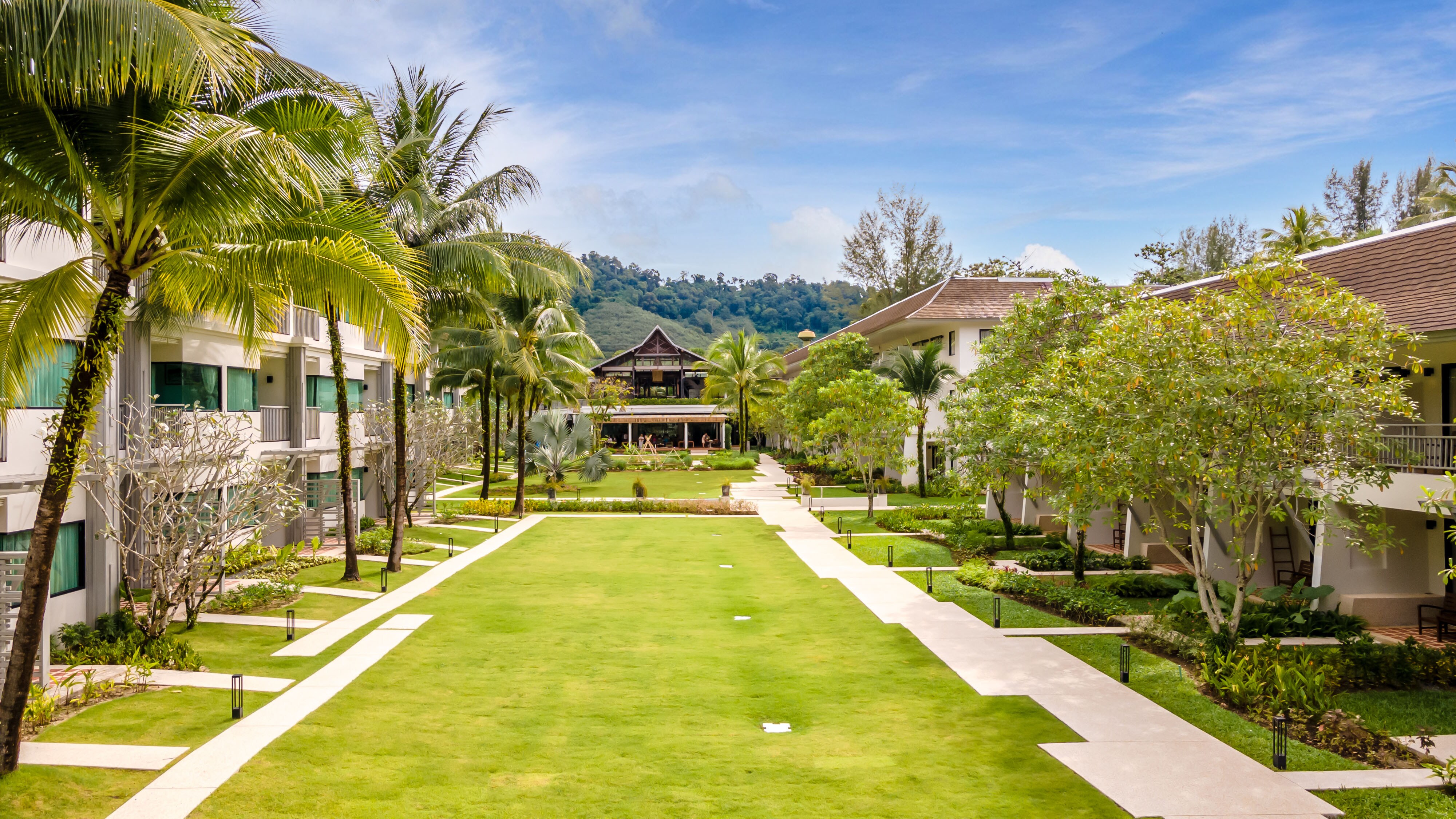 Outrigger Khao Lak Beach Resort - Tap to explore photos