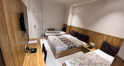 Hotel Sagun - 100 meters From Jaipur Railway Station Room Type - Deluxe Four Bed Room