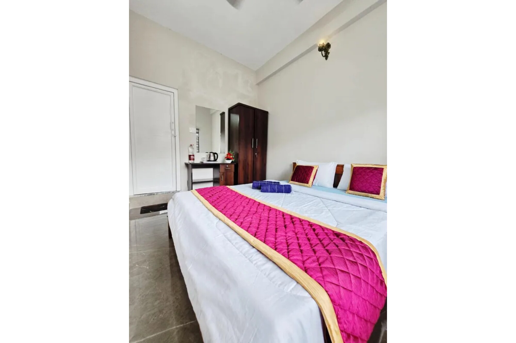 FabHotel Oasis Homes - Tap to explore photos