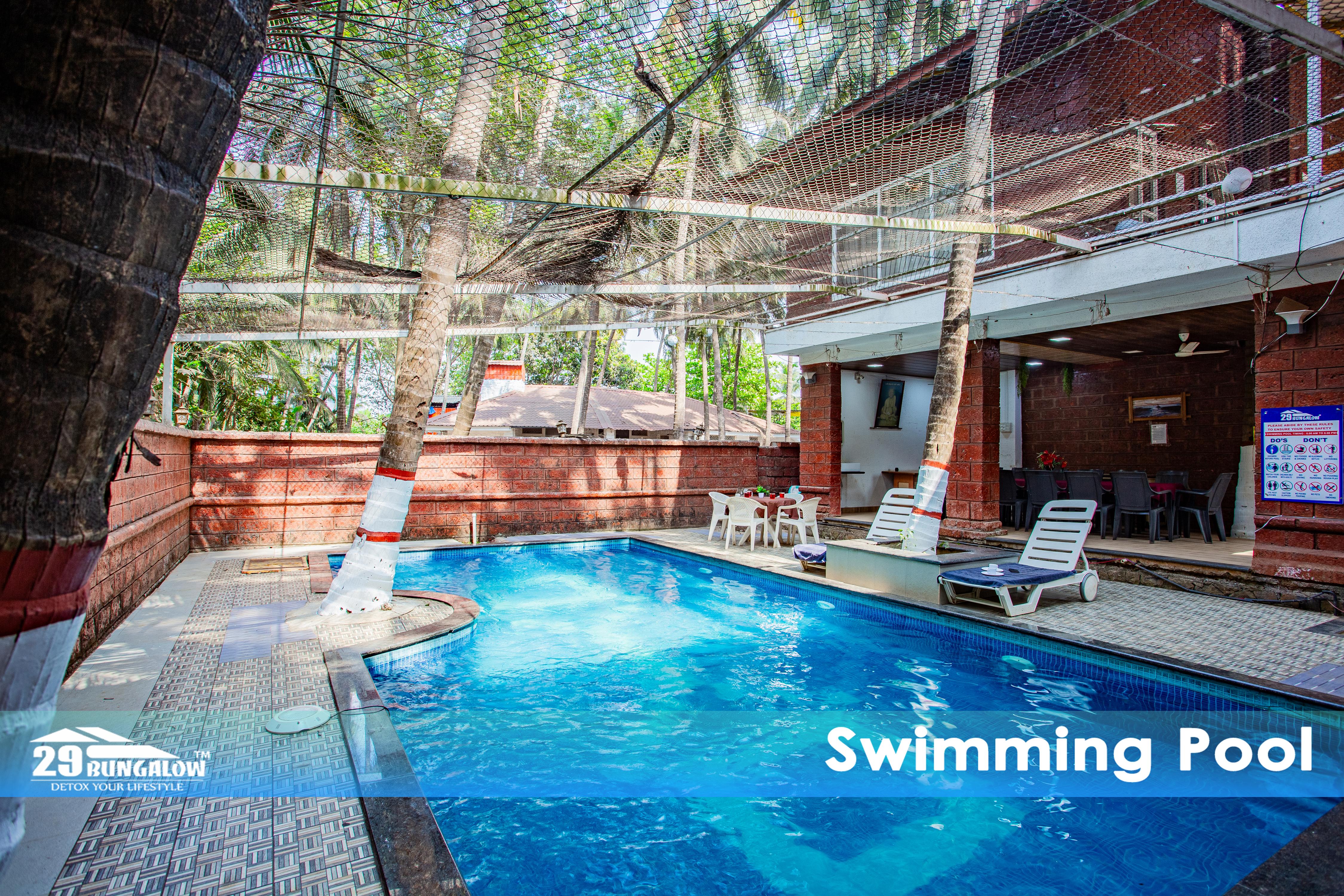 Pool stay at Alibaug by 29bungalow - Tap to explore photos