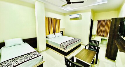 SRI BHAVYA RESIDENCY Room Type - Triple Bed Room AC With RamalayamTemple View