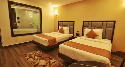 Pristine Pavilion Hotel Room Type - Deluxe Twin Bed