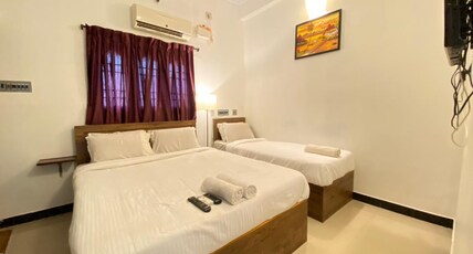 Hotel La Paradise - TIE Hotels & Resorts Room Type - Deluxe Triple - AC Room