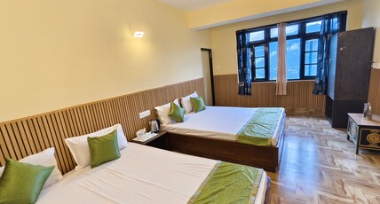 Hotel kanchan Norbu Room Type - Quad Deluxe