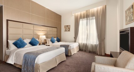Howard Johnson by Wyndham Bur Dubai Room Type - Junior Suite Accommodates 4, 2 Queen Size Beds Howard Johnson by Wyndham Bur Dubai Room Type - Junior Suite Accommodates 4, 2 Queen Size Beds