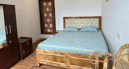 Mountain paradise homestay batashia loop Room Type - Deluxe Double Room with Balcony.