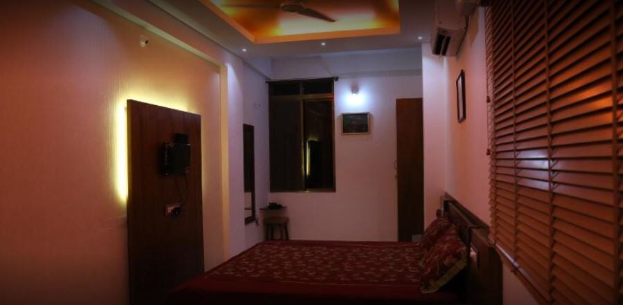 Mudra Mid town rooms and suites - Tap to explore photos