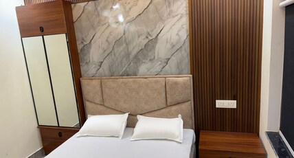 Hotel Shri Naresh Room Type - Deluxe Family Room with attached Kitchen and Terrace Hotel Shri Naresh Room Type - Deluxe Family Room with attached Kitchen and Terrace