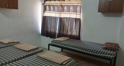 Paarijat PG Classic family room with veg breakfast Room Type - Classic family bedroom for four