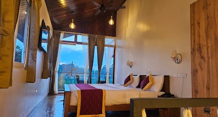 ASR Holidays ,Valparai Room Type - Luxury wooden suite 2 with Balcony and river view ASR Holidays ,Valparai Room Type - Luxury wooden suite 2 with Balcony and river view