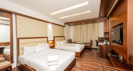 HOTEL PREETHI INTERNATIONAL Room Type - Family Room with Two Queen Beds