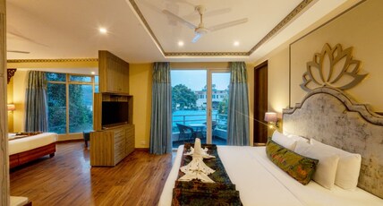 GANGA KINARE- A Riverside Boutique Resort Room Type - Family Room- Partial River view