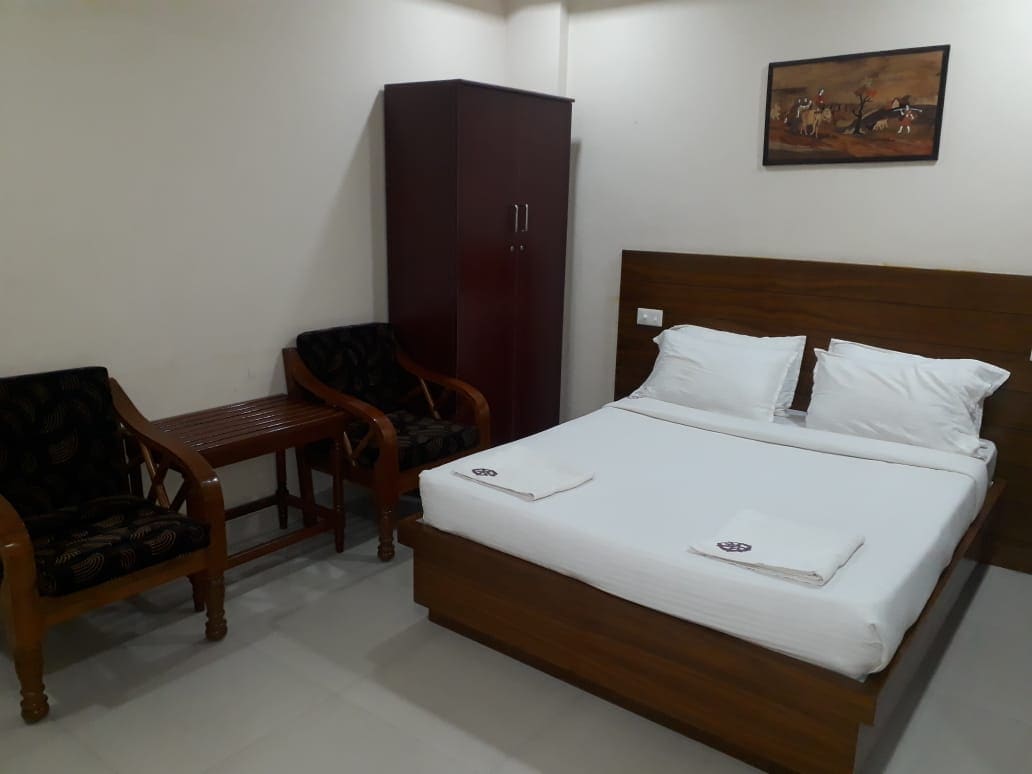 Chakraa Residency A/C - Tap to explore photos