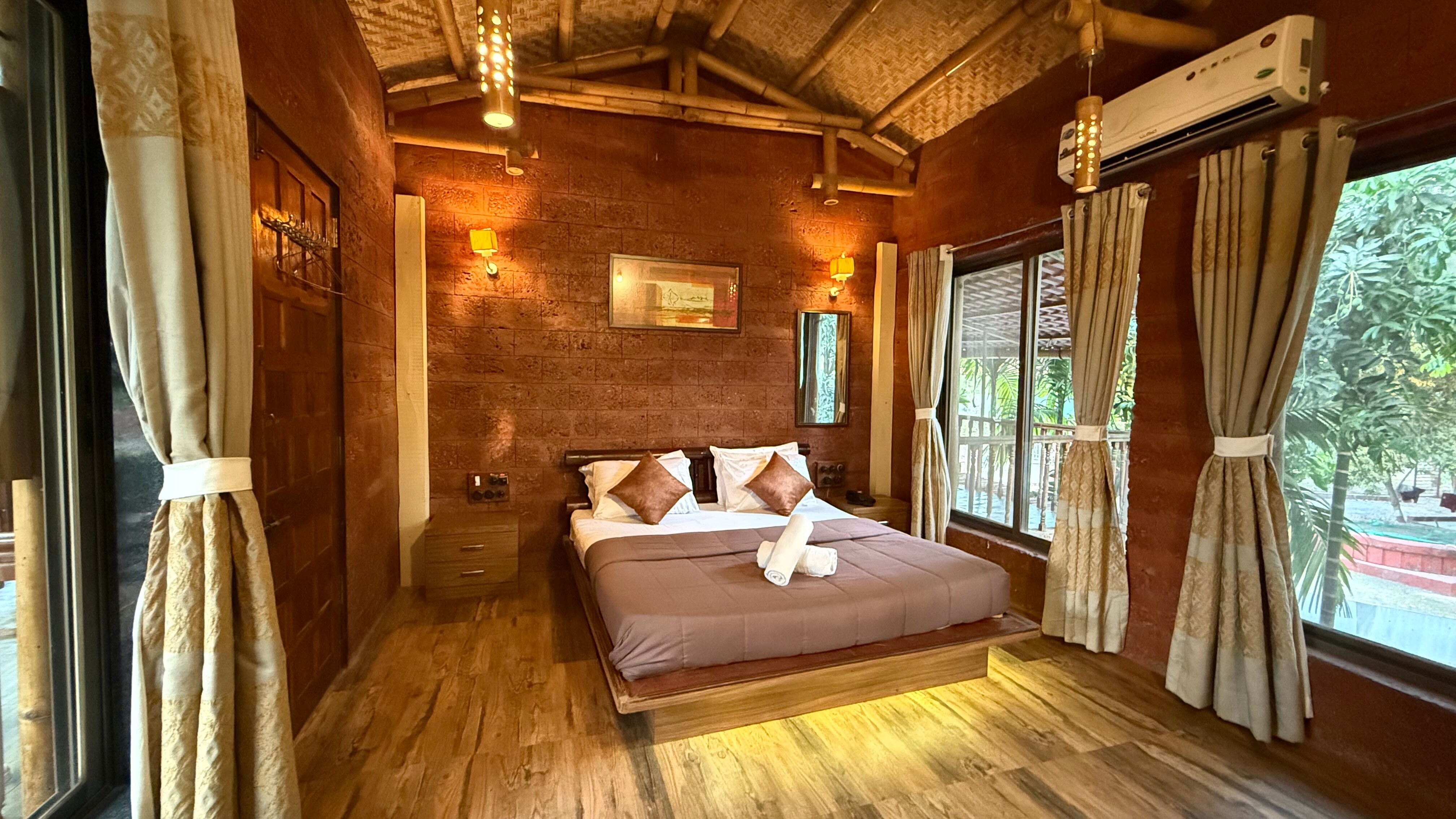 Kashid Boutique Resort | Rooms & Pool - Tap to explore photos