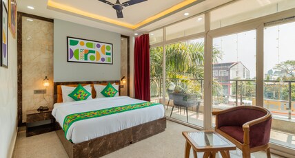 Treebo Arya Palace With Swimming Pool Room Type - Premium Room with Balcony