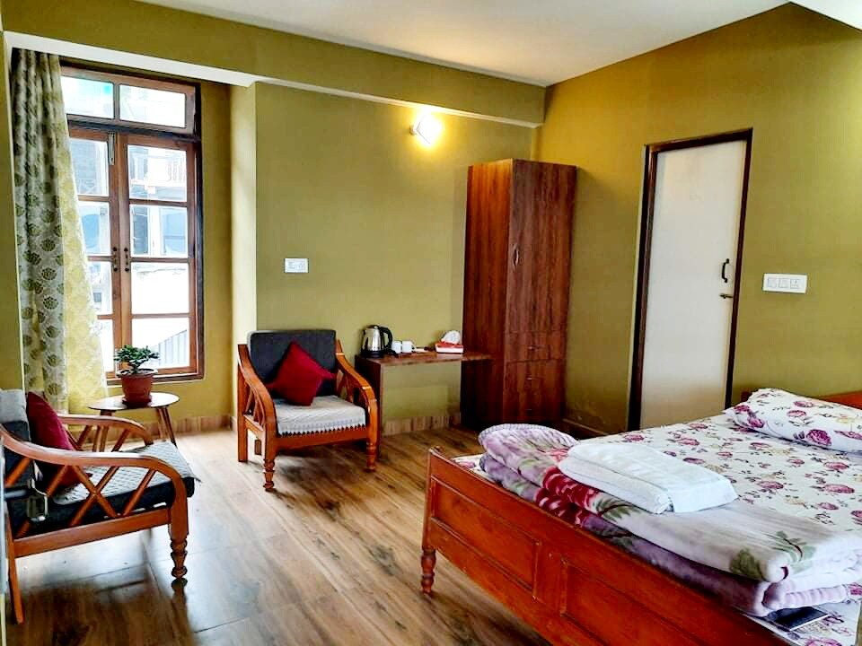 Sunrise Inn Homestay | Rooms & Caretaker - Tap to explore photos
