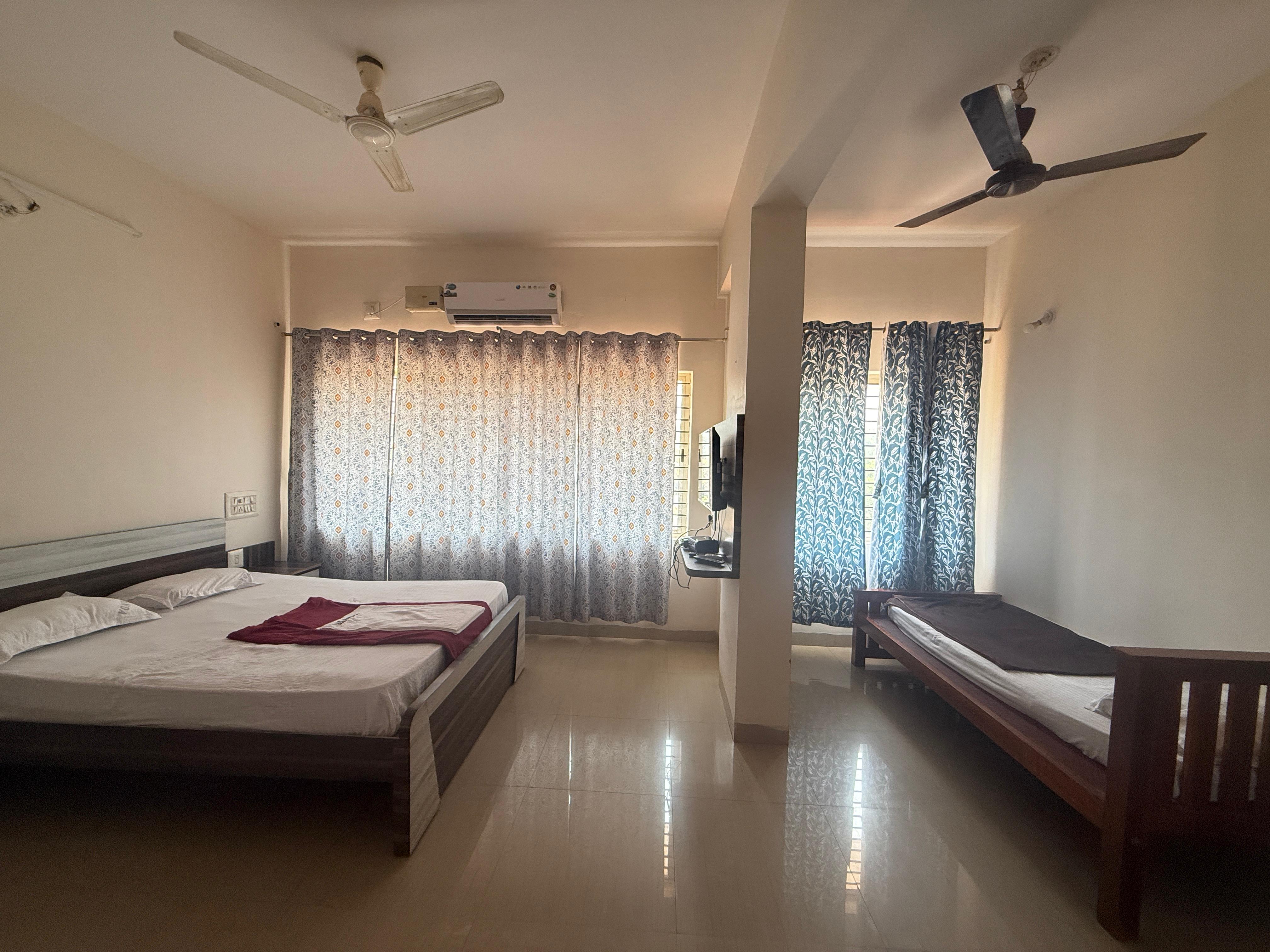 Hotel Sai Skanda - Tap to explore photos