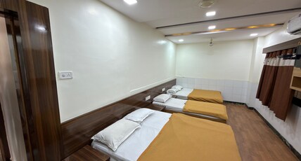 SAI BHAWANI HOTEL Room Type - 5 Bed AC Room SAI BHAWANI HOTEL Room Type - 5 Bed AC Room