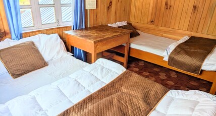 Accomoon valleyside homes Room Type - Triple bed deluxe room with hills view