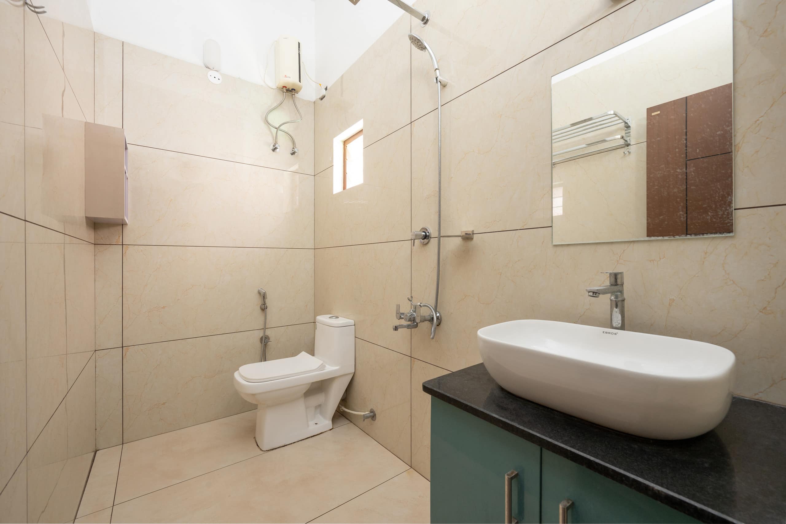 Bastiat Stays Modern 1BHK Near Kaloor Stadium - Tap to explore photos