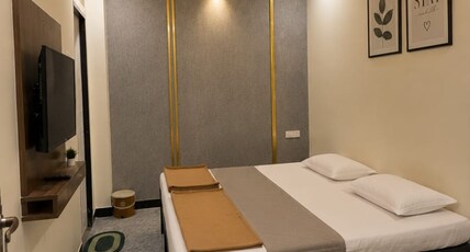 Tirupati Inn Guest House Room Type - Deluxe Double Bed Room