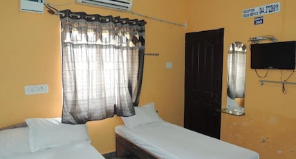 Hotel Radha Party Hall Room Type - Deluxe Three Bedroom AC