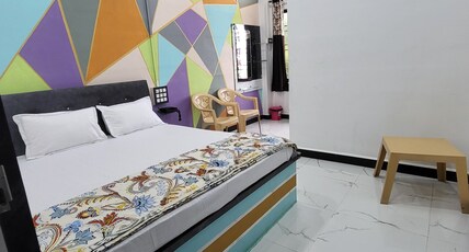 Hotel  radhika &resort Room Type - Bedroom 101