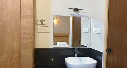 BESTO INN RESIDENCY Room Type - Deluxe Room with Air Conditioning