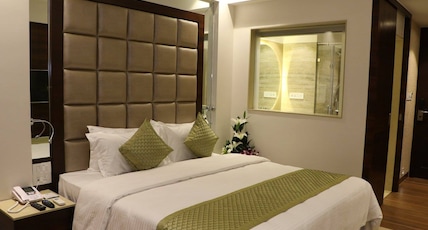 Perfectstayz Premium Grand Inn Room Type - Executive room with Balcony and Pool view Perfectstayz Premium Grand Inn Room Type - Executive room with Balcony and Pool view