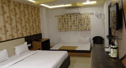 Shree Kailash Hotel & Restaurant Room Type - FOUR BED DELUXE ROOM