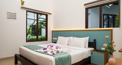 Misty Lake Resort By Sylora Hotels, Munnar Room Type - Deluxe Room NON AC